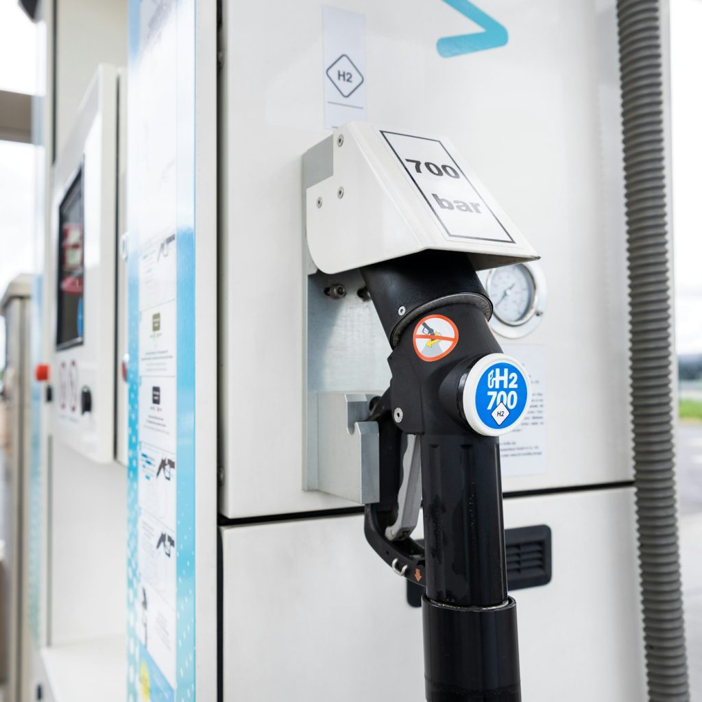 Close-up detail view of hydrogen fuel filler nozzle nozzle adapter car H2 gas filling station in